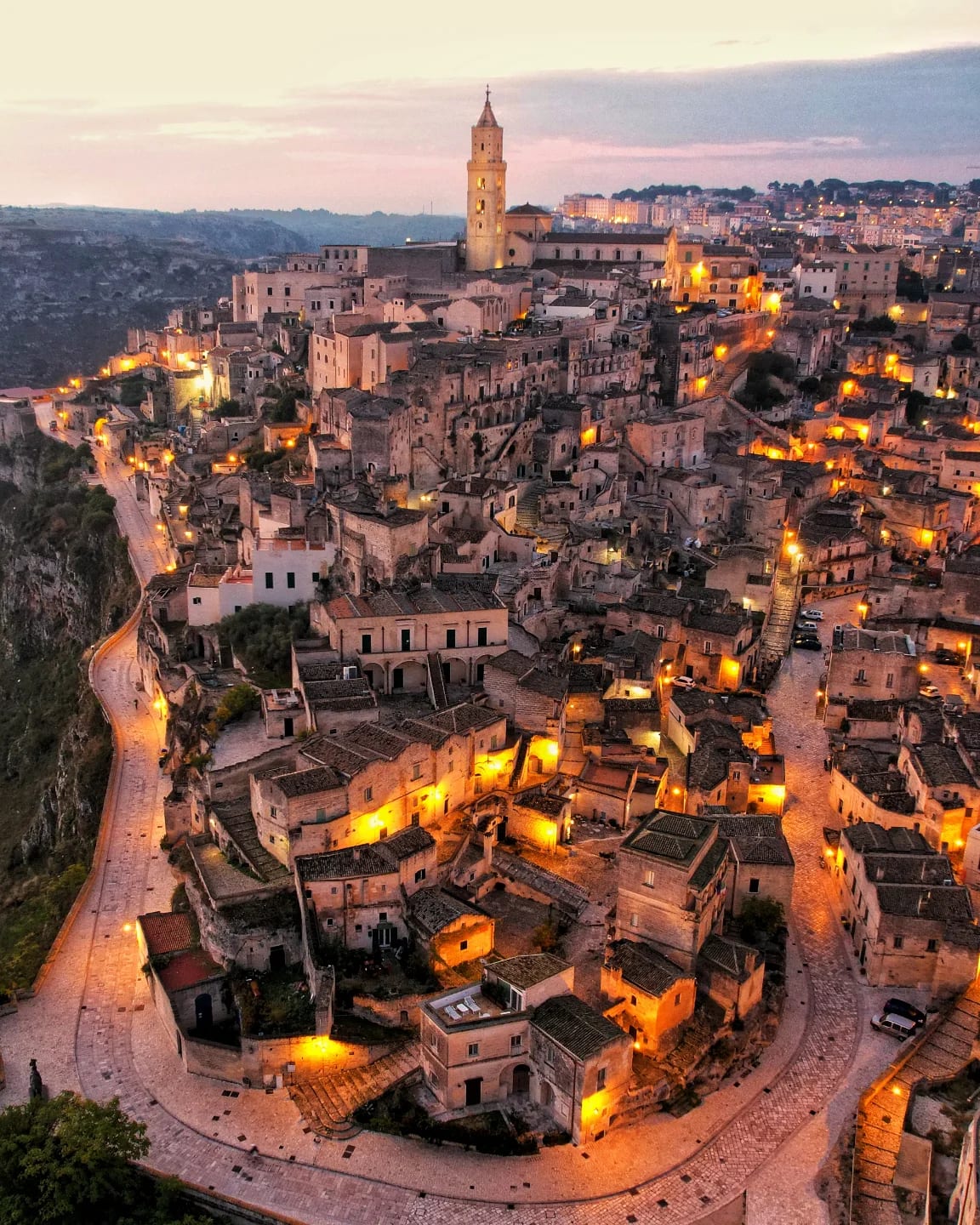 The Sassi di Matera and the Cathedral bell tower at golden hour